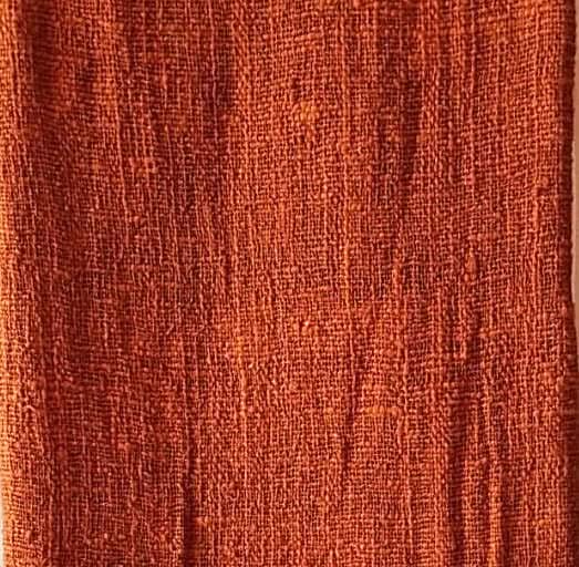 Plaid doux avec pompons en terre de sienne brûlée